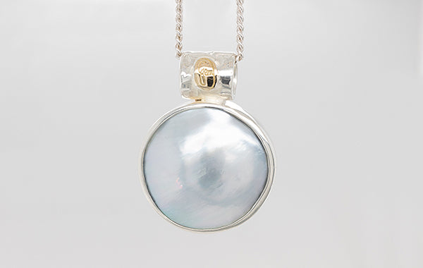 Mabe Round Pendant Embossed Stamped