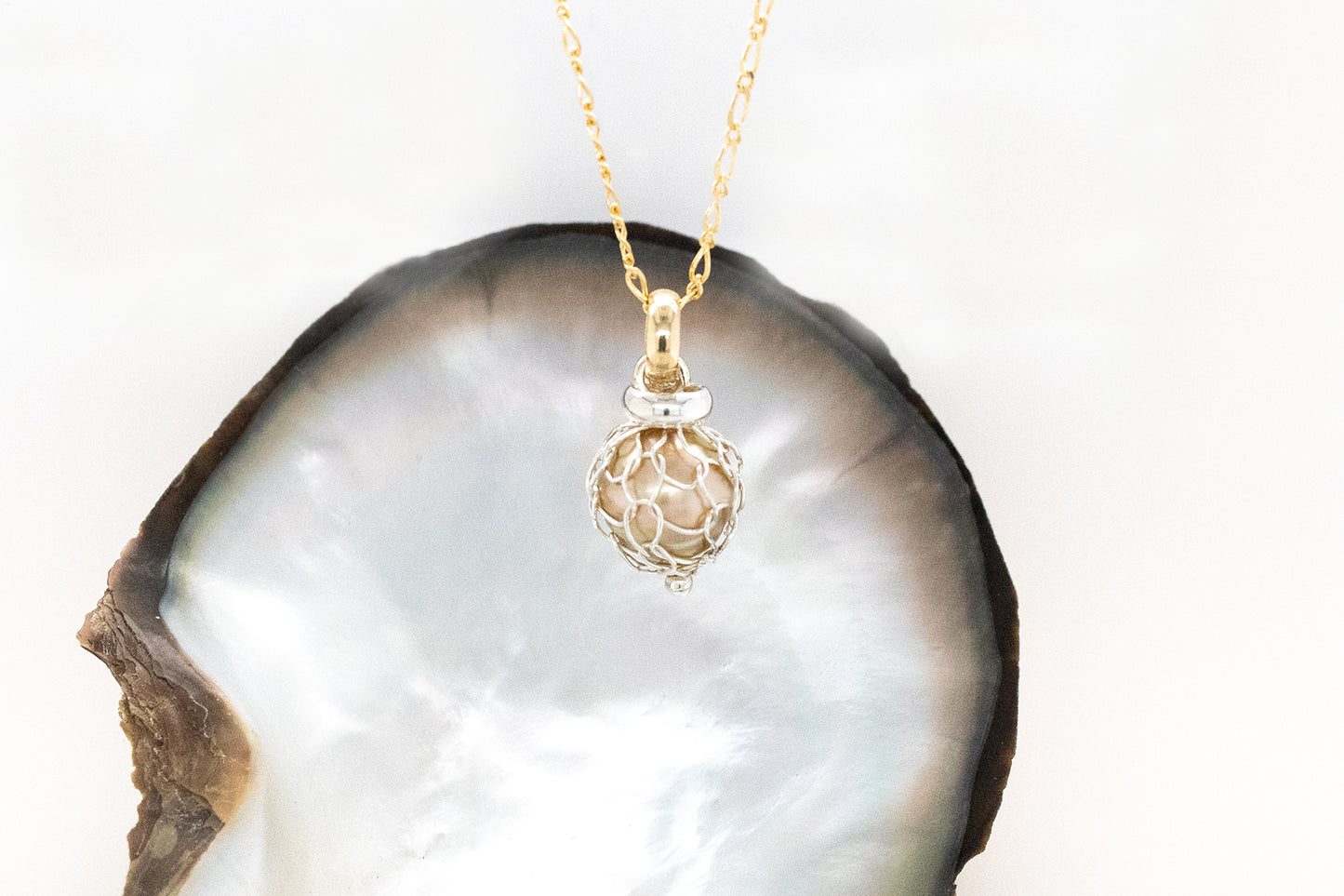 Knitting Wrapped Golden Pearl Pendant