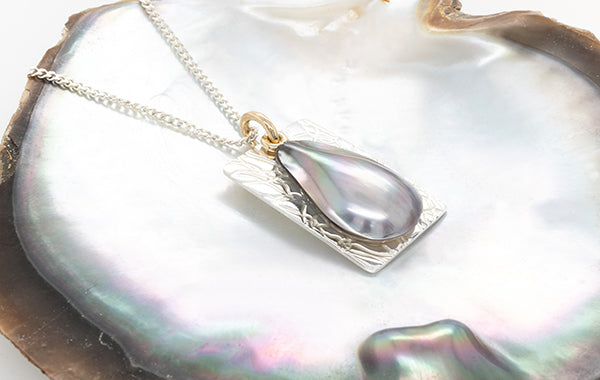 Mabe Embossed Layered Pendant