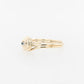 Gold Swirl Ring with Blue Diamond