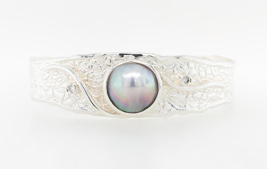 Embossed SS Mabe Cuff 2x0.06ct Dia