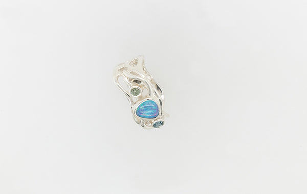 Opal ring with Green Sapphire and Light Blue Toaz