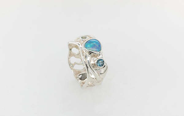 Opal ring with Green Sapphire and Light Blue Toaz