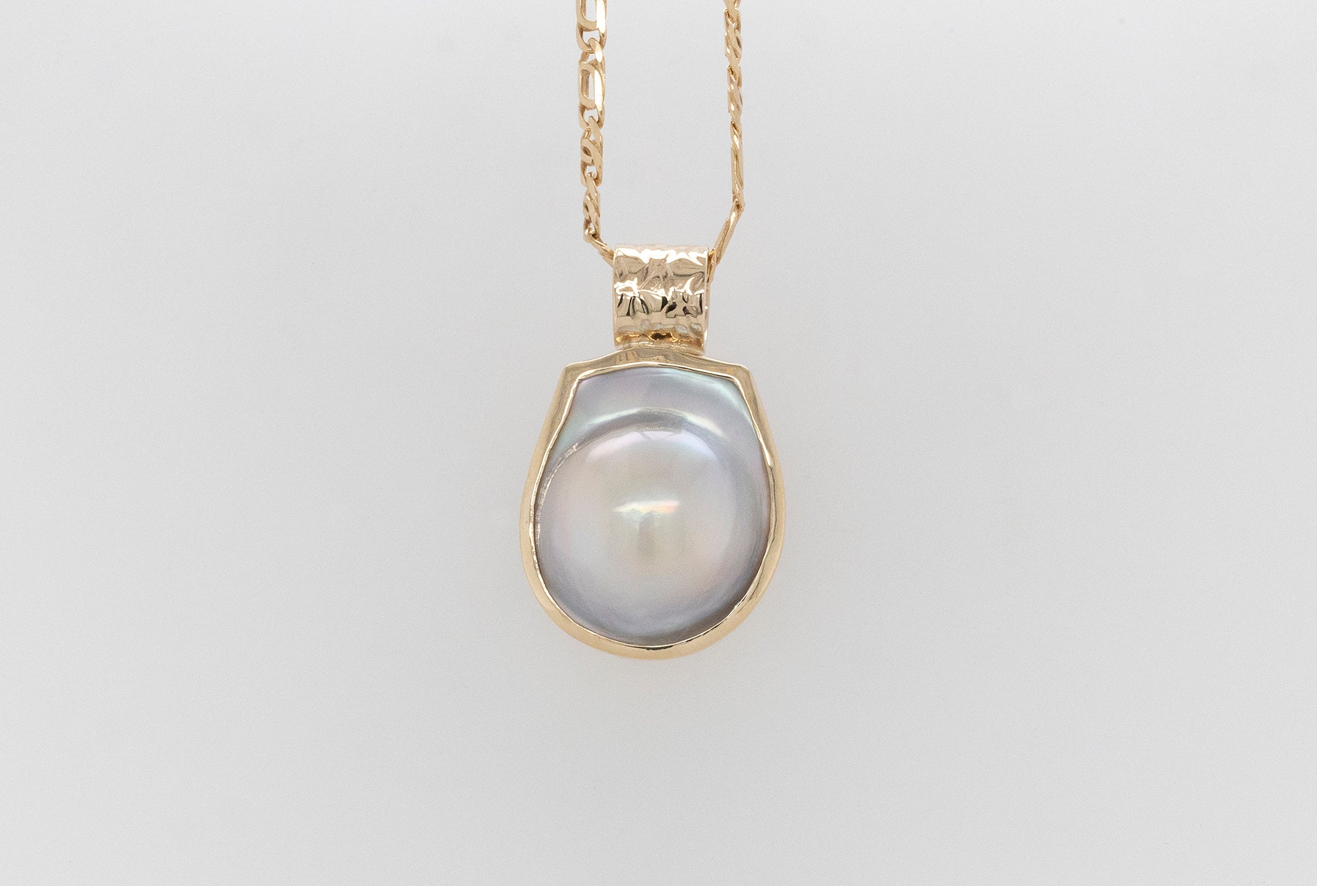Abrolhos Islands mabe pearl pendant with embossed bale