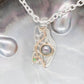 Tsavorite Garnet and Abrolhos Pearl Oceania Pendant