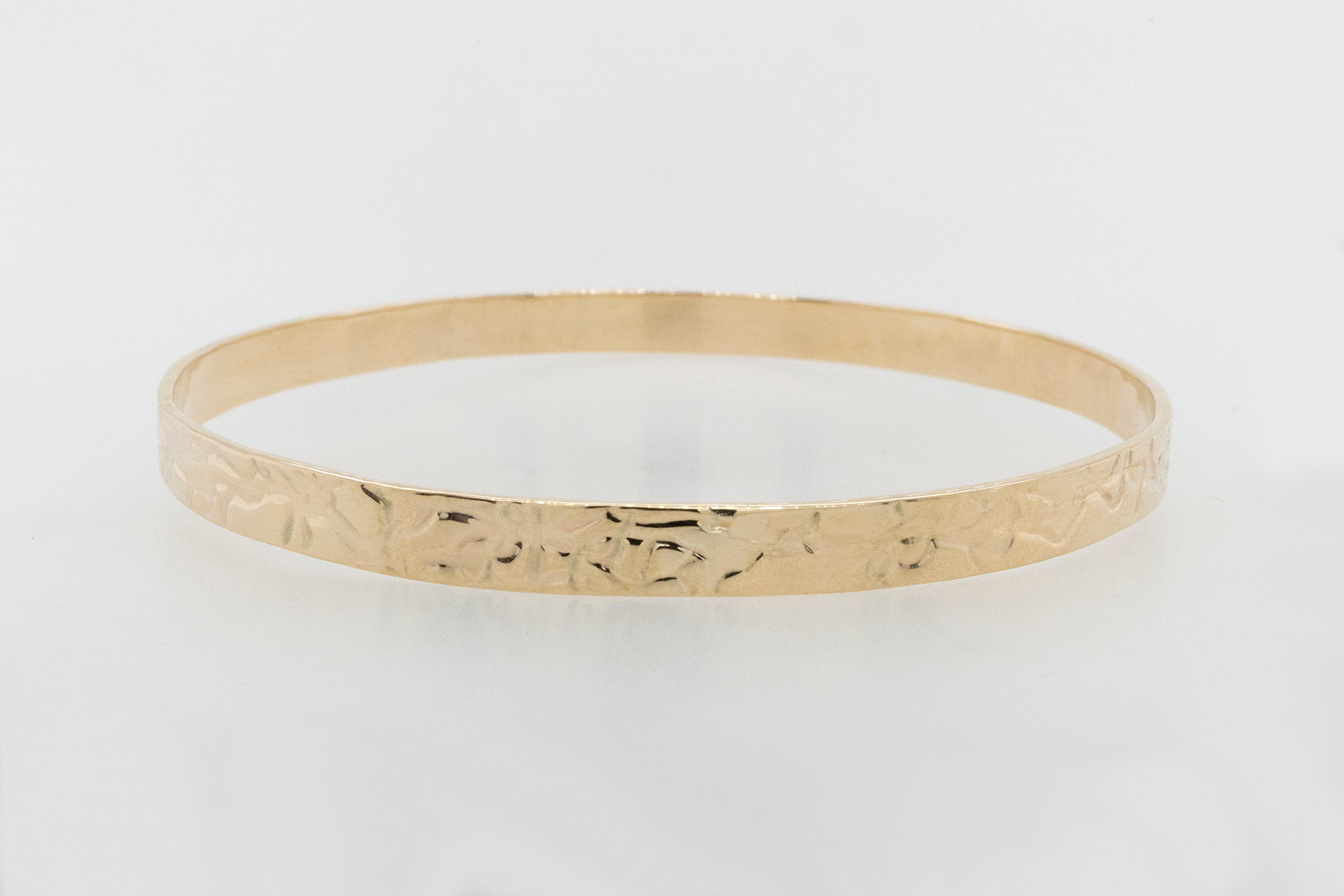 Embossed 5.3mm Solid Gold Bangle