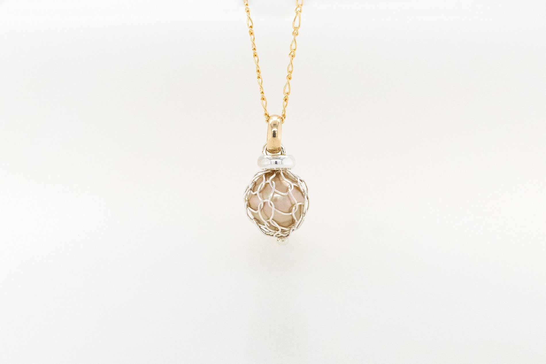 Knitting Wrapped Golden Pearl Pendant 