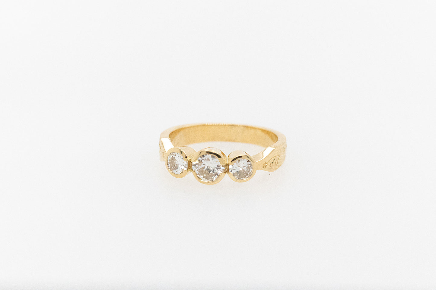 Trilogy Bezel Set Floral Engraved Engagement Ring