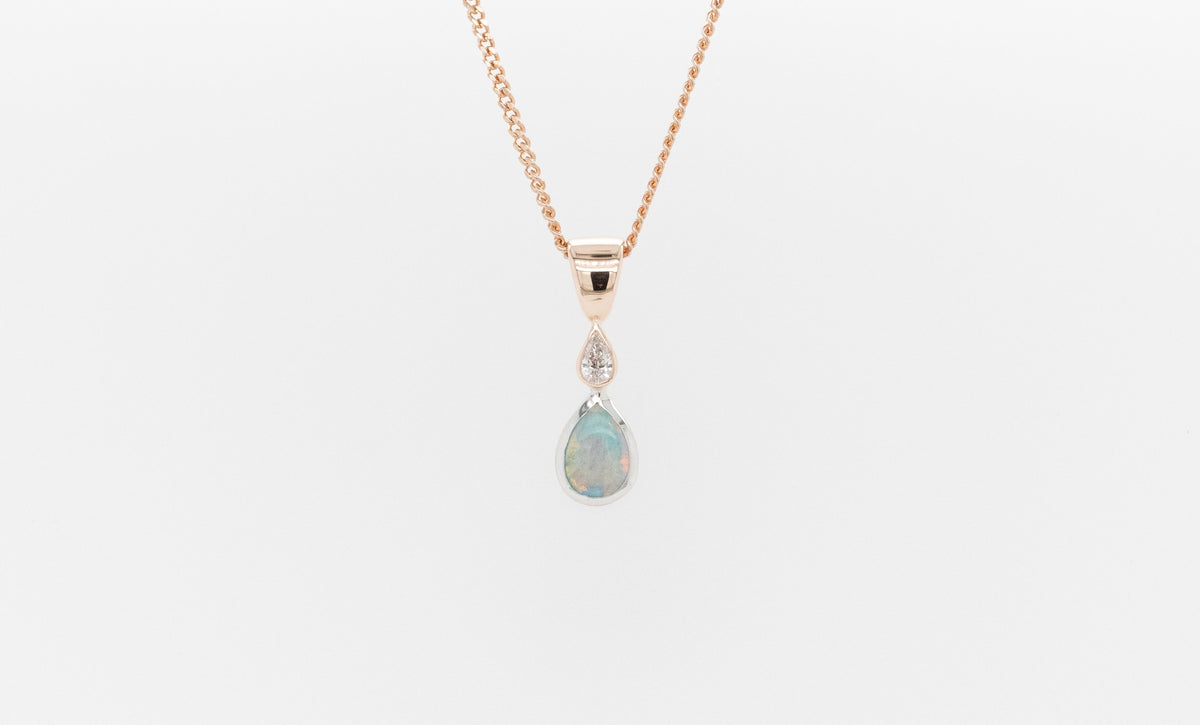 Pear Shaped Opal and Diamond Pendant 