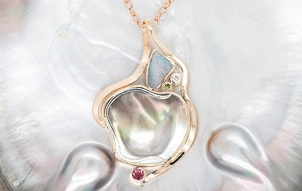 Mabe, Diamond, Opal, Tourmaline & Sapphire Pendant.